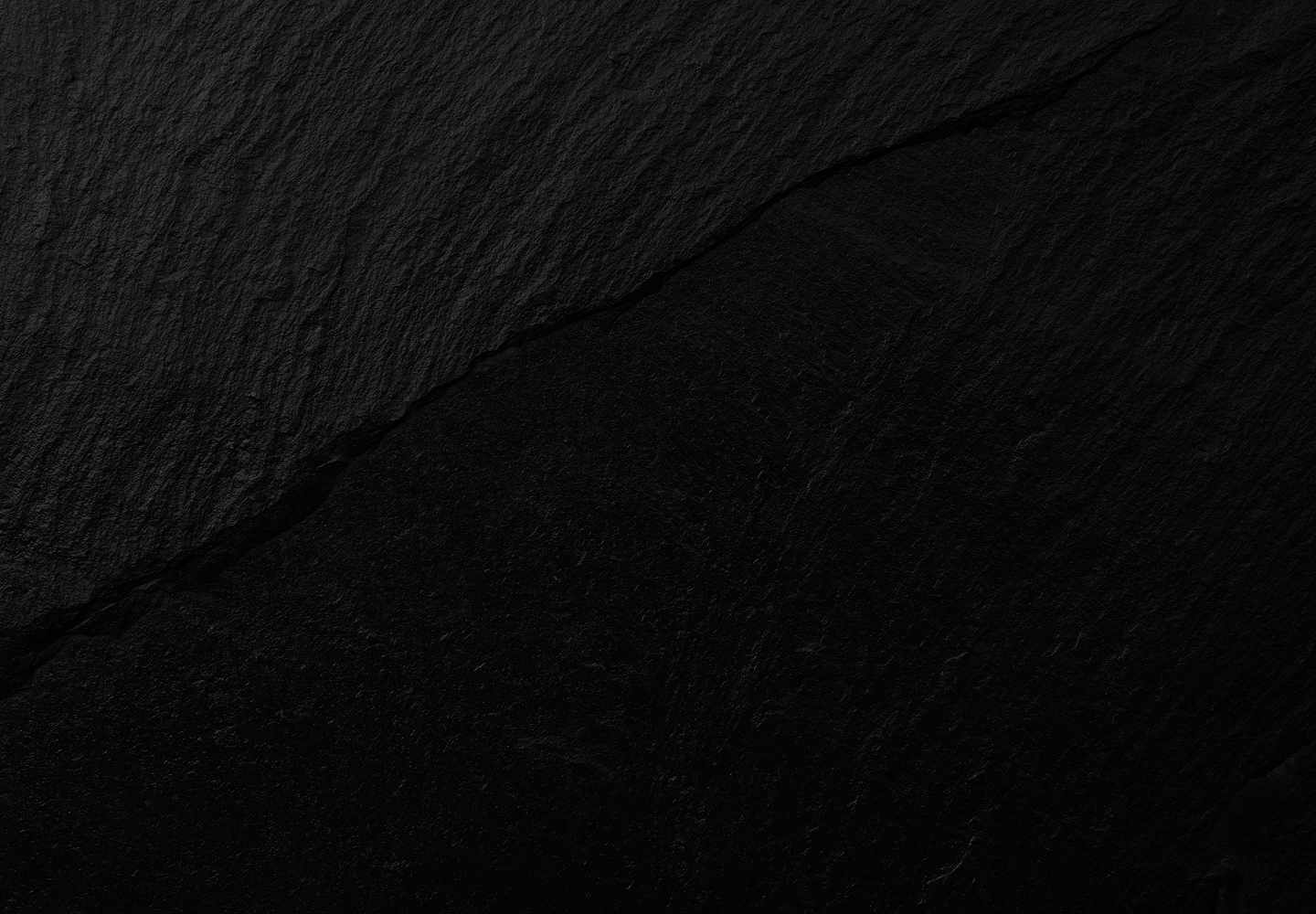 Black textured rock background image